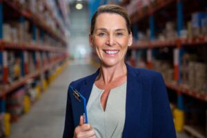 Woman smiling with clip board time management