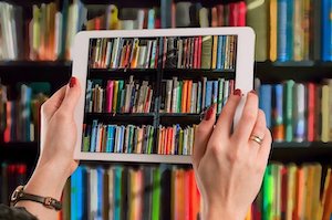 business bookshelf and tablet