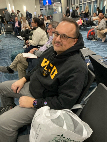 Butch Sarma waiting to board a flight